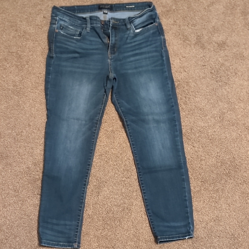 Judy Blue Jeans with Tapered Leg and Subtle Fading